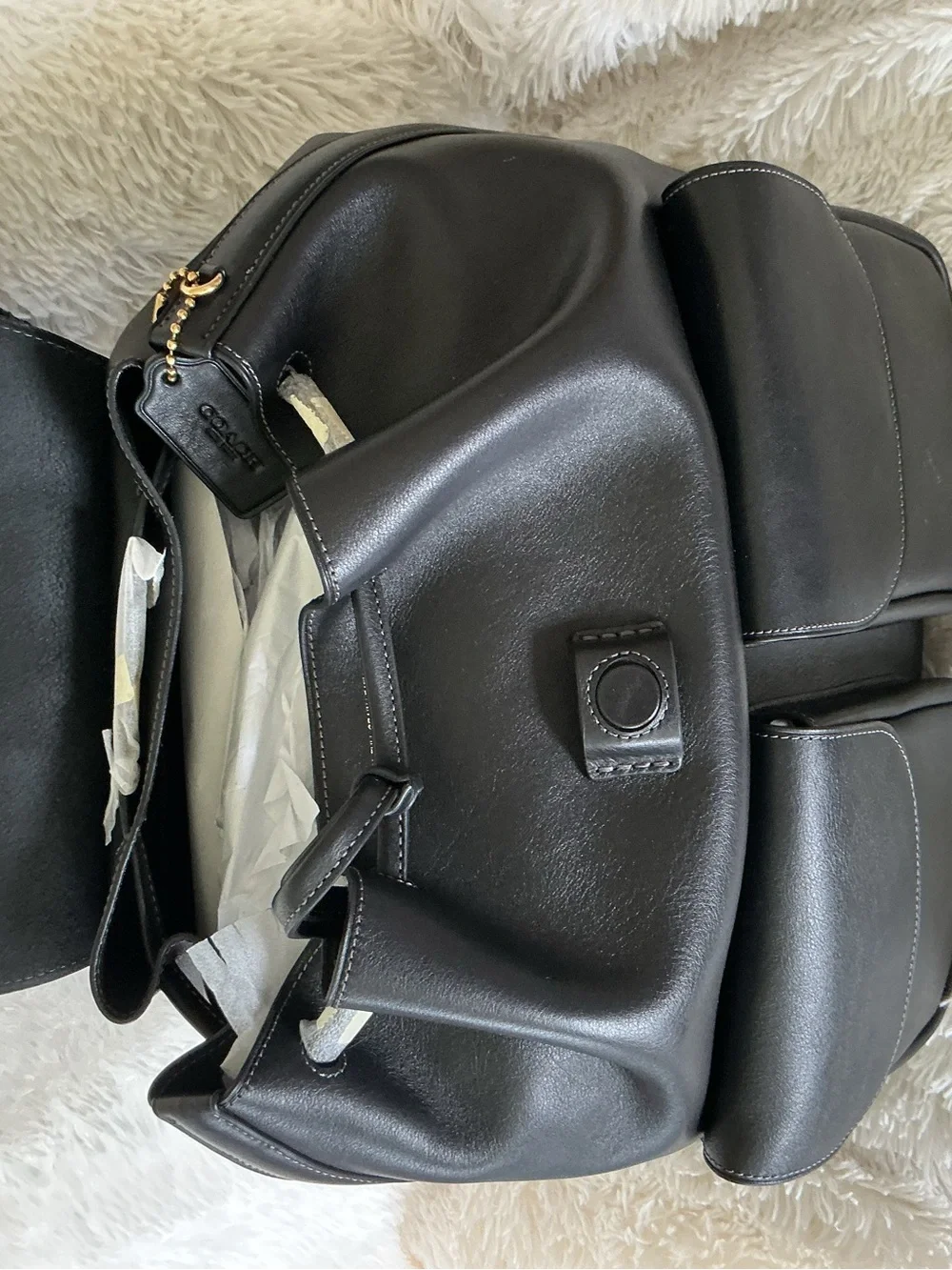 Coach Crosby Black Leather Backpack with Dual Front Pockets and Gold Logo